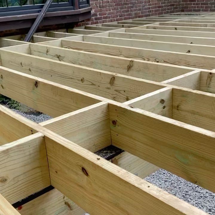 Pressure-treated joists and blocking before decking