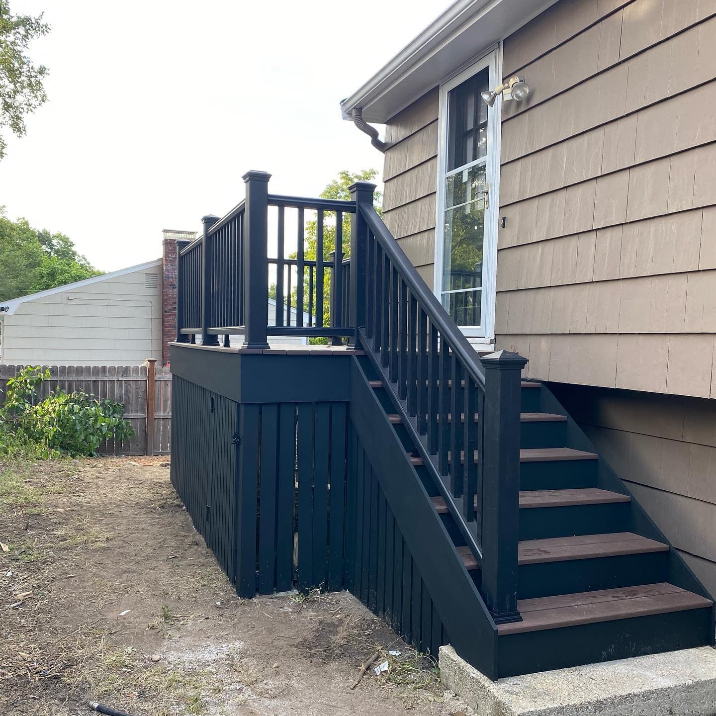 Navy painted stairs and railing