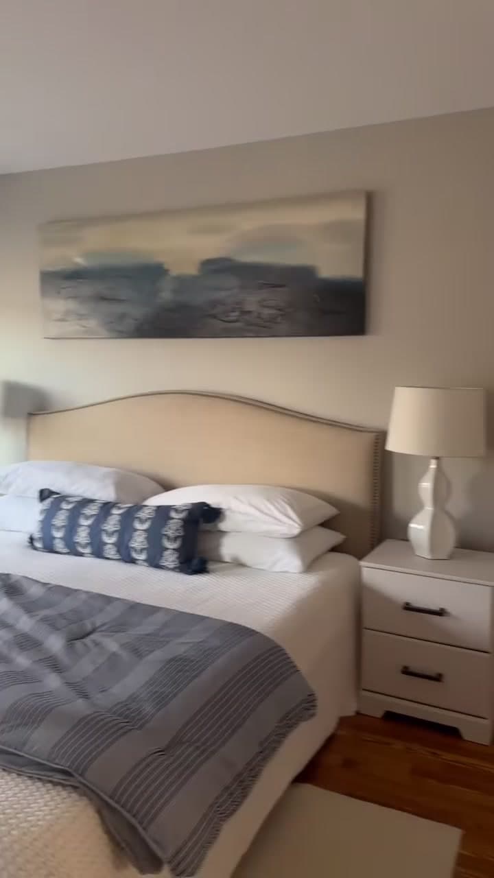 Renovated bedroom with new floors and fresh paint